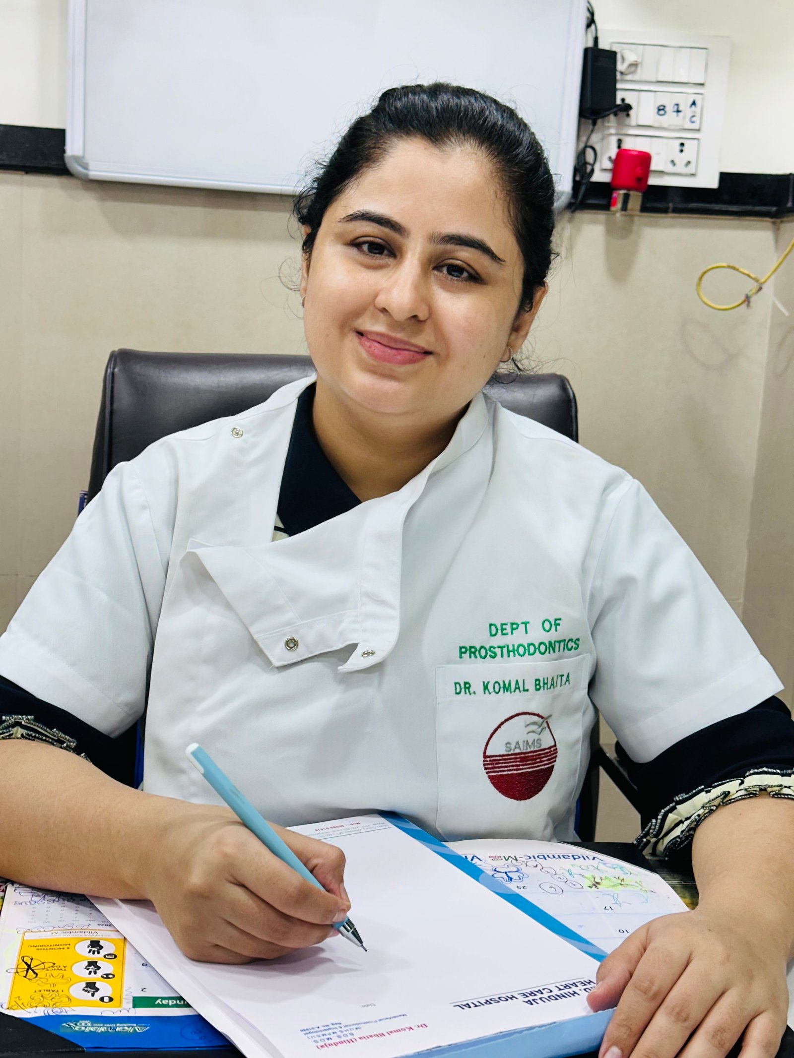 Dr. Komal Bhatia, Founder & Prosthodontist